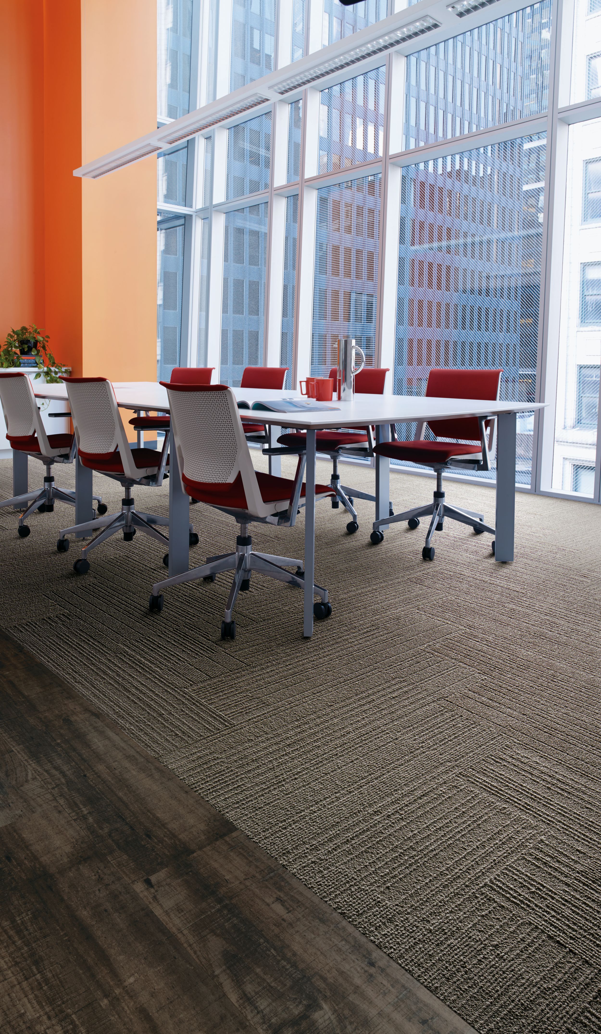 Interface On Line plank carpet tile in meeting room with orange wall and red chairs image number 8